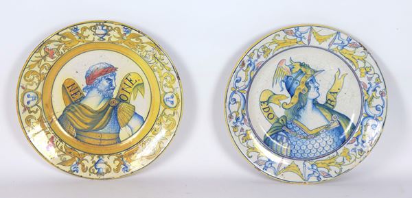 "Nerone" and "Edora", a pair of antique Deruta glazed majolica wall plates with polychrome decorations