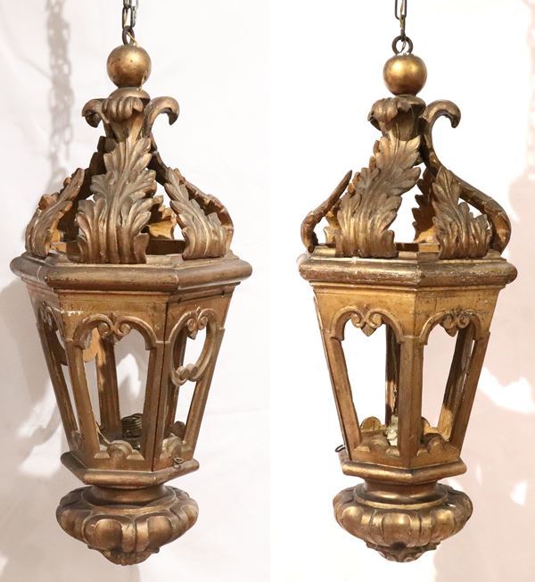 Pair of antique Venetian lanterns in gilded and carved wood