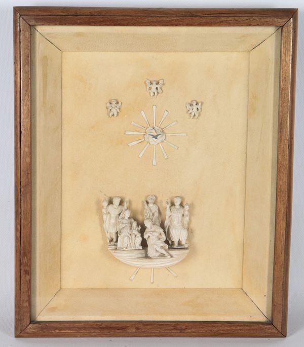 "Nativity with the Adoration of the Magi", small foam group within a walnut display case frame