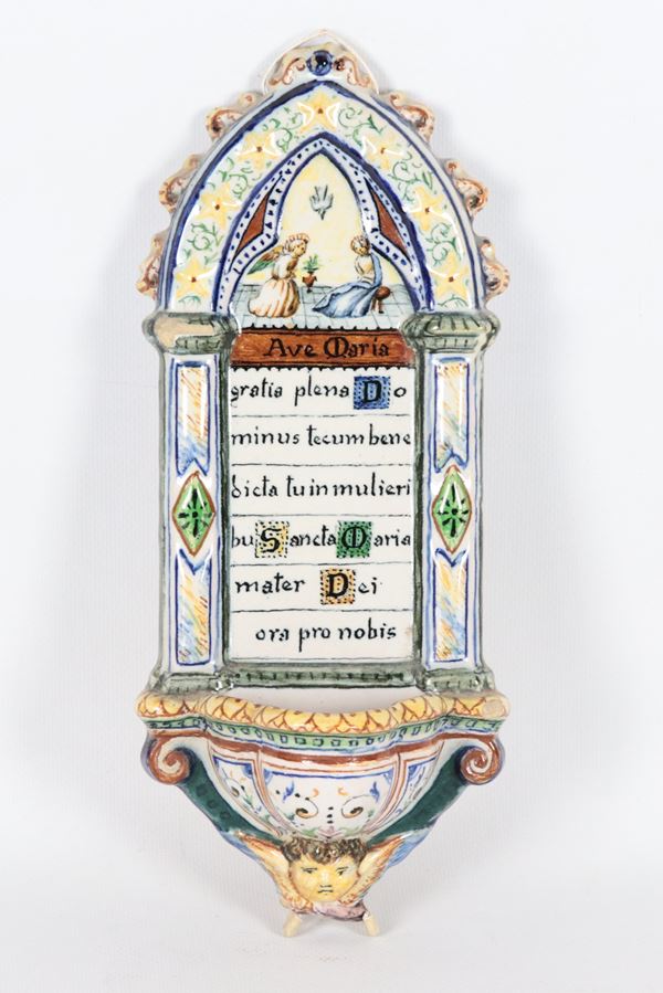 Holy water stoup in enamelled and polychrome majolica from Pesaro, marked Molaroni
