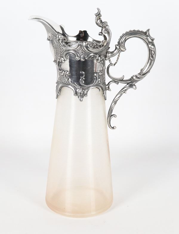 Antique Art Nouveau glass carafe with spiral-worked glass, with handle and neck in embossed and chiseled silver-plated metal