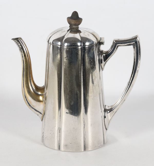 Antique coffee pot in silver-plated metal and embossed with pods