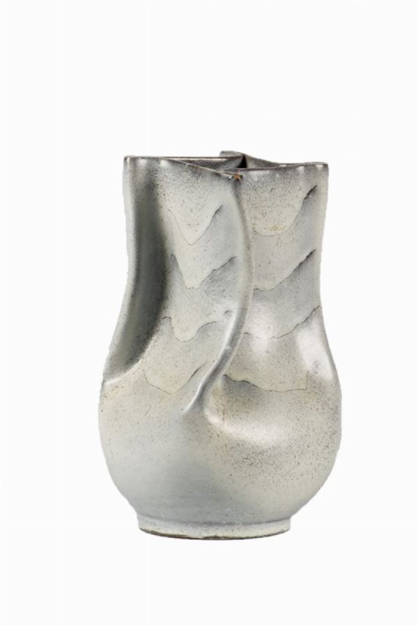 Small porcelain and glazed terracotta vase