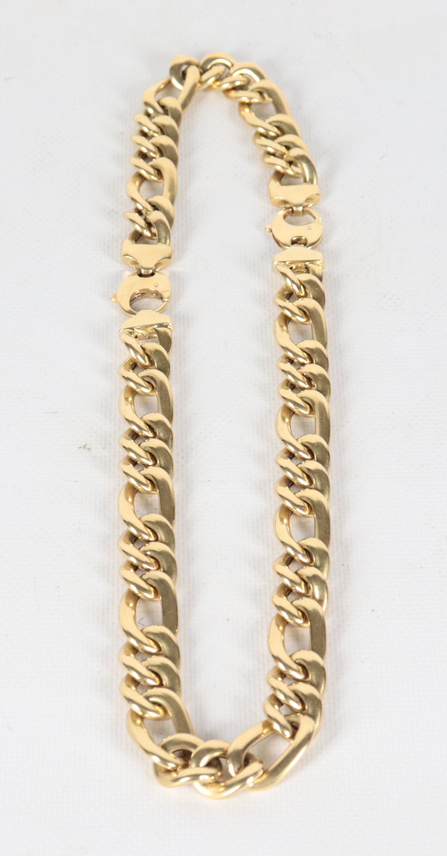 Demi parure in oro giallo 18kt, composta da bracciale e collana girocollo. Peso gr. 127