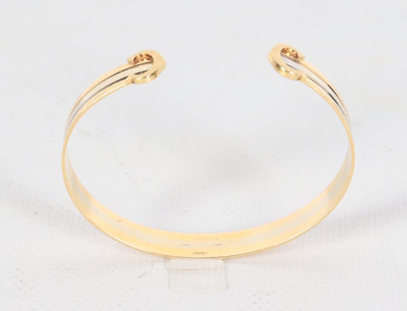 Bracciale "Doppia C" in oro 18kt a tre colori. Peso gr. 17,5
