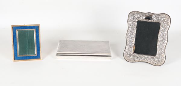 Lotto in argento e smalto di due cornici portaritratti e una scatola rettangolare portasigarette