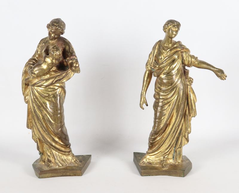 "Allegorie dell'Antica Roma", coppia di antiche sculture romane in bronzo dorato, sbalzato e cese...