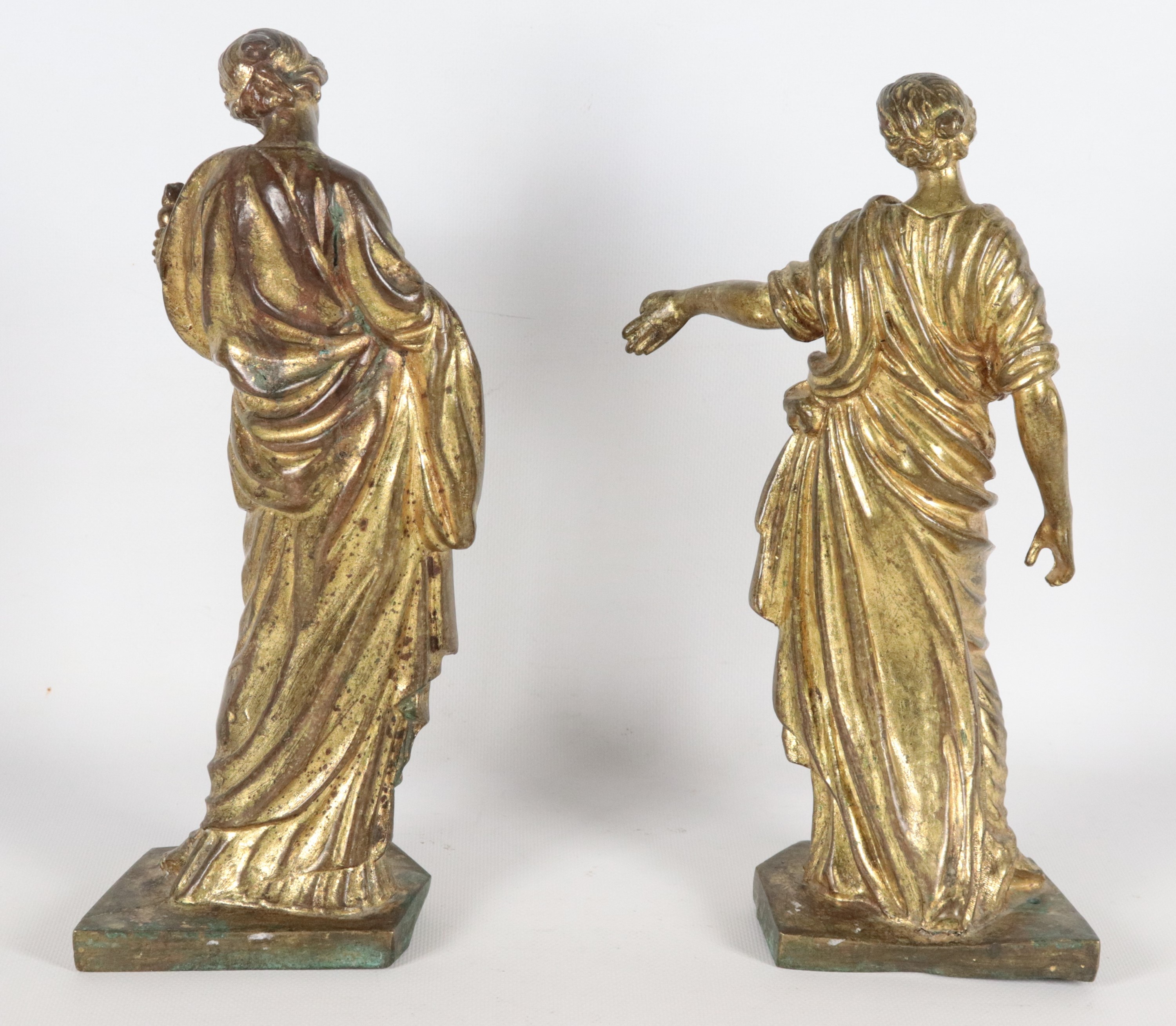 "Allegorie dell'Antica Roma", coppia di antiche sculture romane in bronzo dorato, sbalzato e cese...