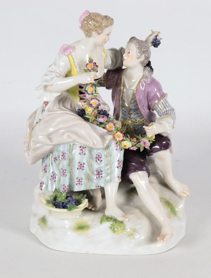 "Scena galante", antico piccolo gruppo in porcellana policroma Meissen