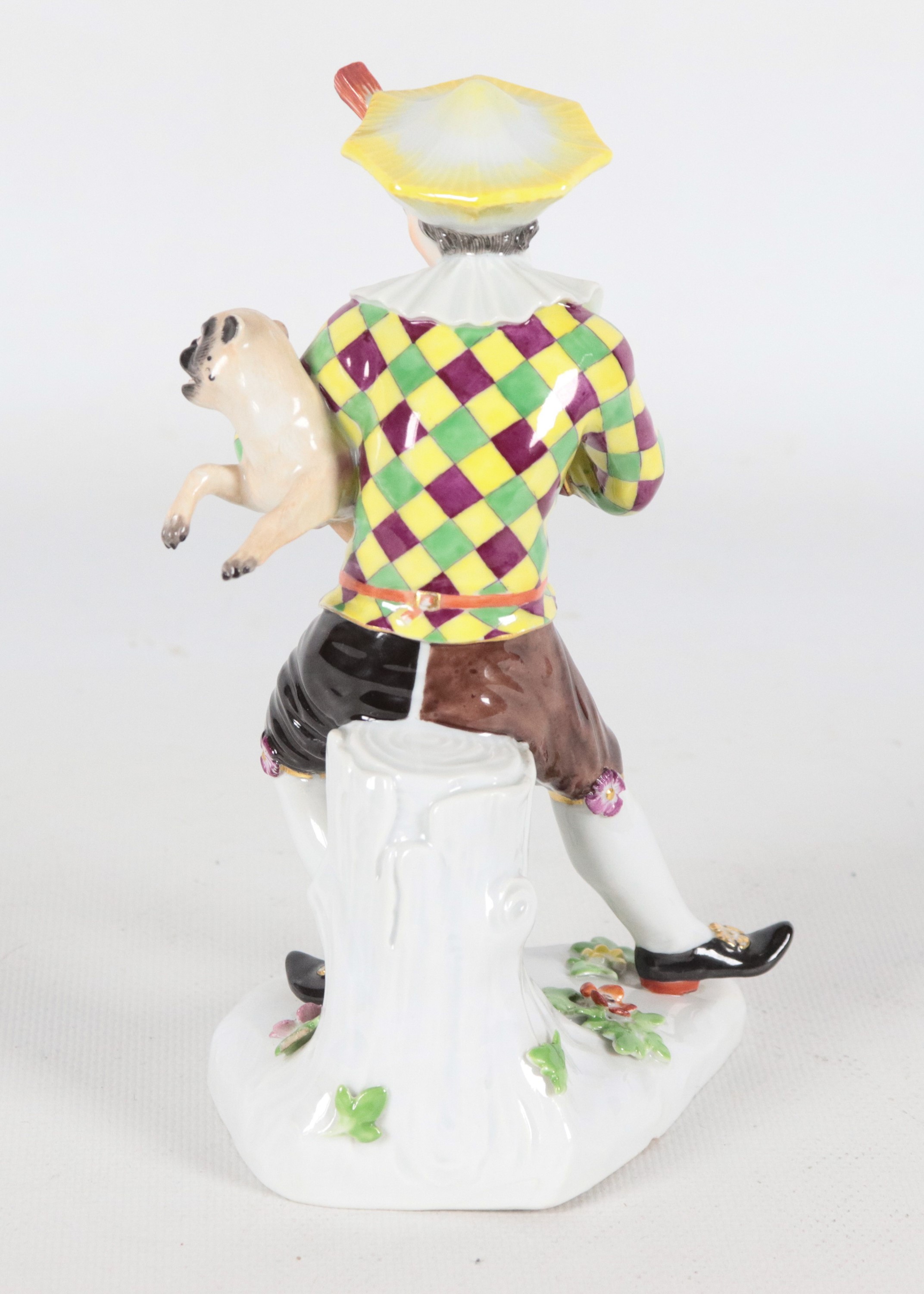 "Arlecchino con cagnolino", antica piccola scultura in porcellana policroma Meissen