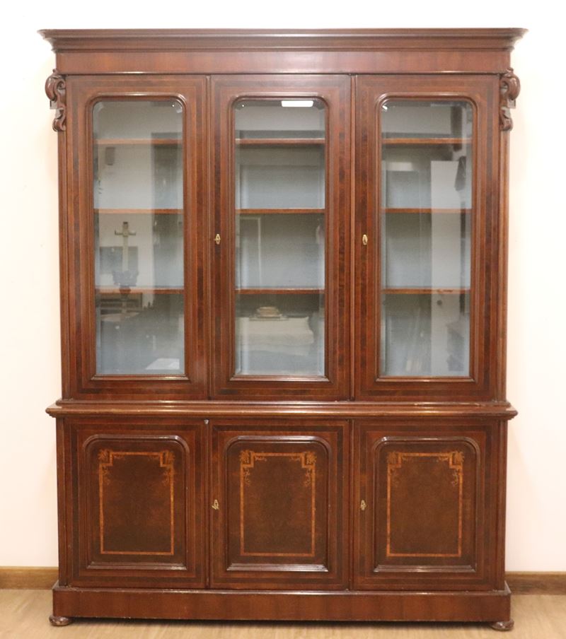 Libreria a tre sportelli in noce e radica di noce