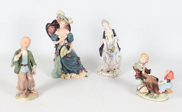 Lotto di quattro statuine in ceramica porcellanata e policroma (4 pz)