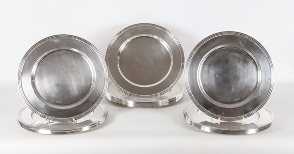 Lotto di diciotto sottopiatti in acciaio argentato