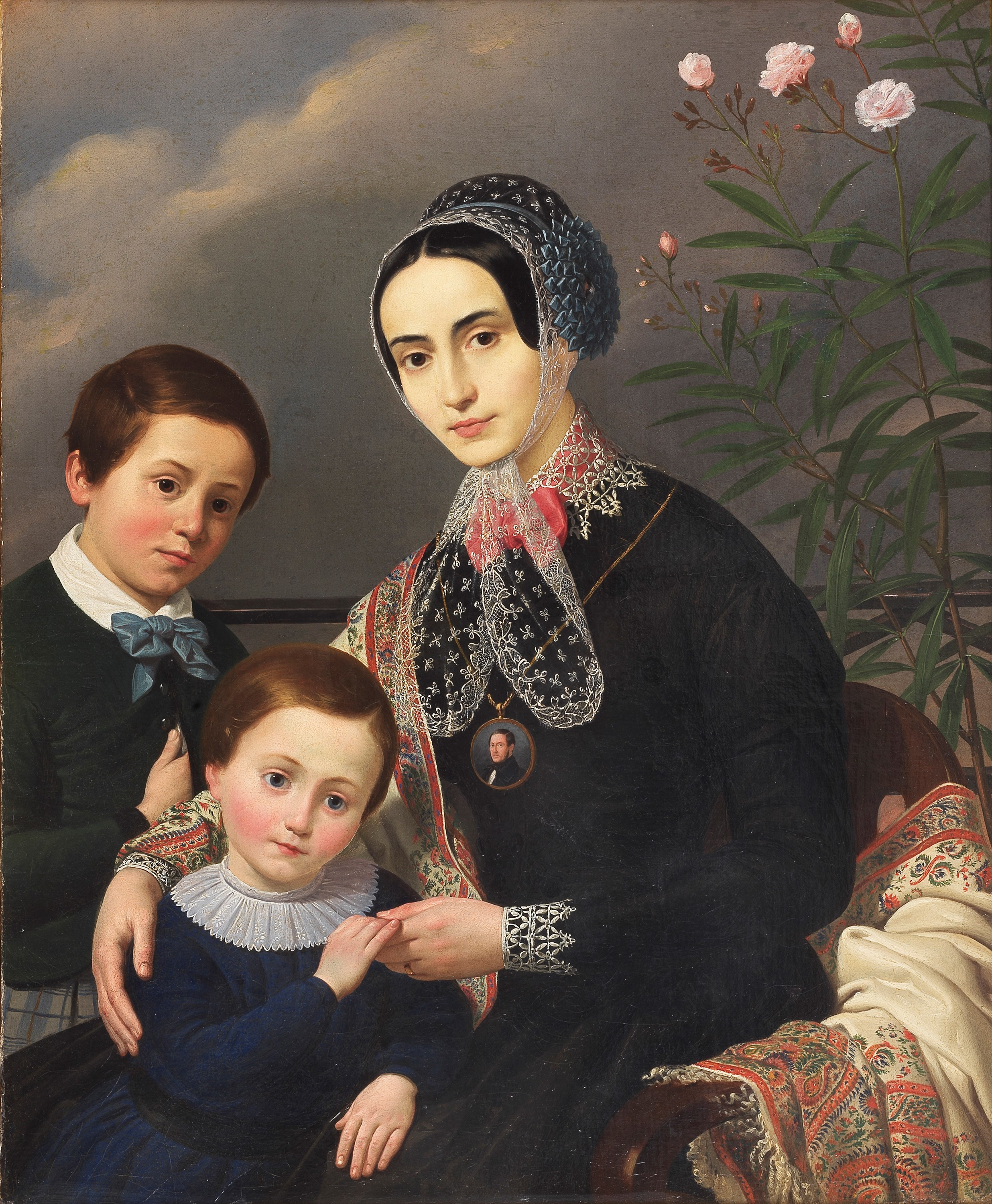 "Ritratto di famiglia con mamma e figli"