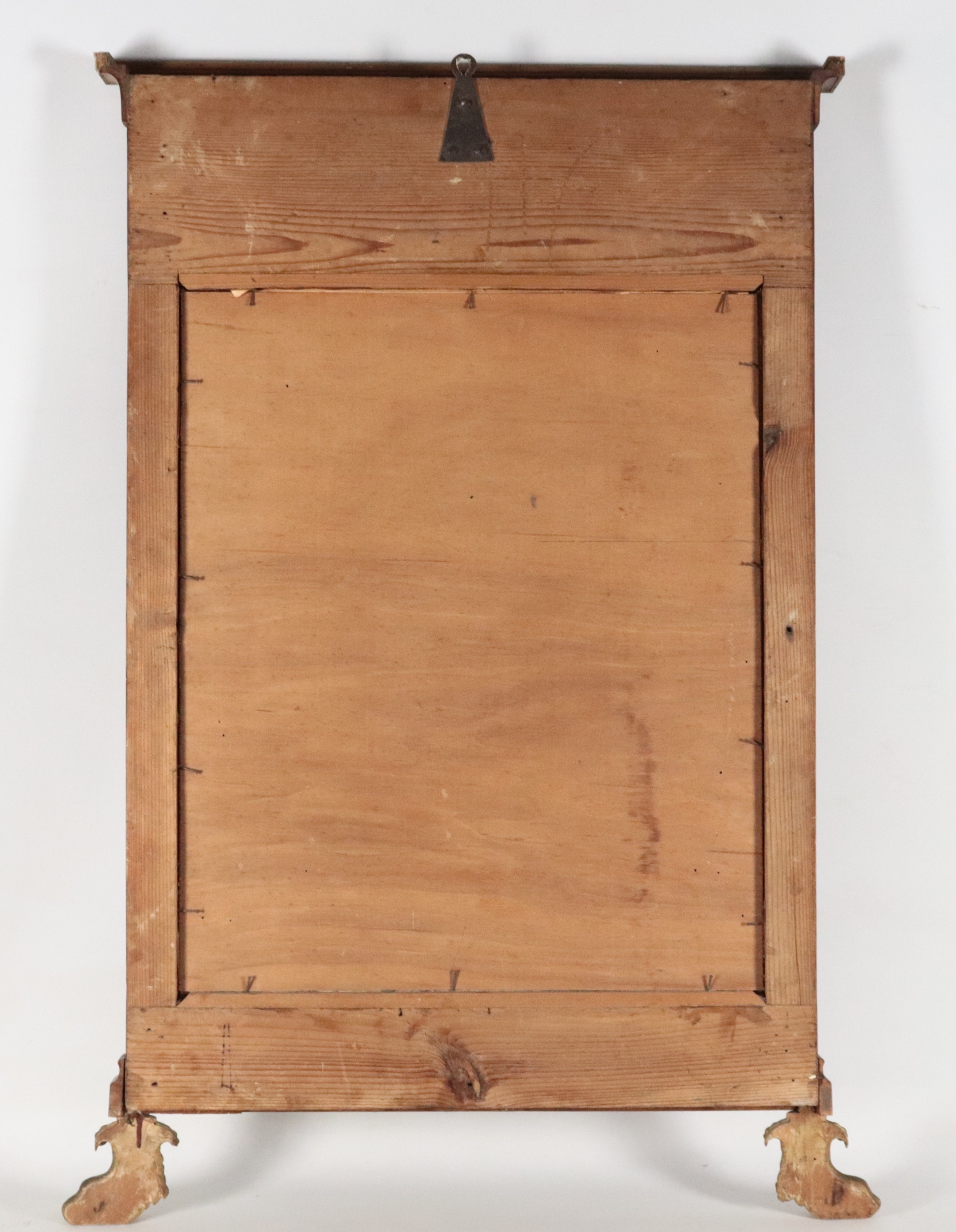 Antica specchiera toscana Impero in noce, con fregi in bronzo dorato e sorretta da due zampe leon...