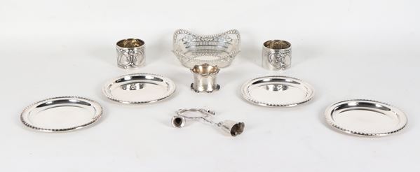 Lotto in argento cesellato e sbalzato (9 pz.), gr. 450