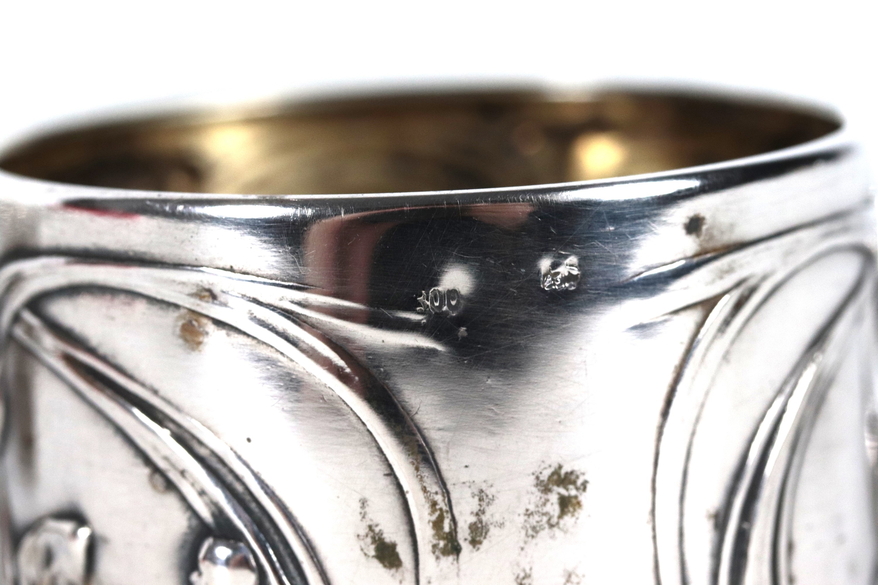 Lotto in argento cesellato e sbalzato (9 pz.), gr. 450