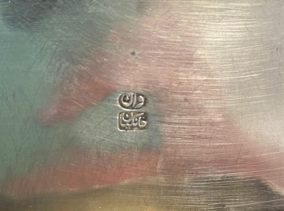 Lotto di quattro antiche tabacchiere in argento cesellato, sbalzato e niellato: una russa con Bol...