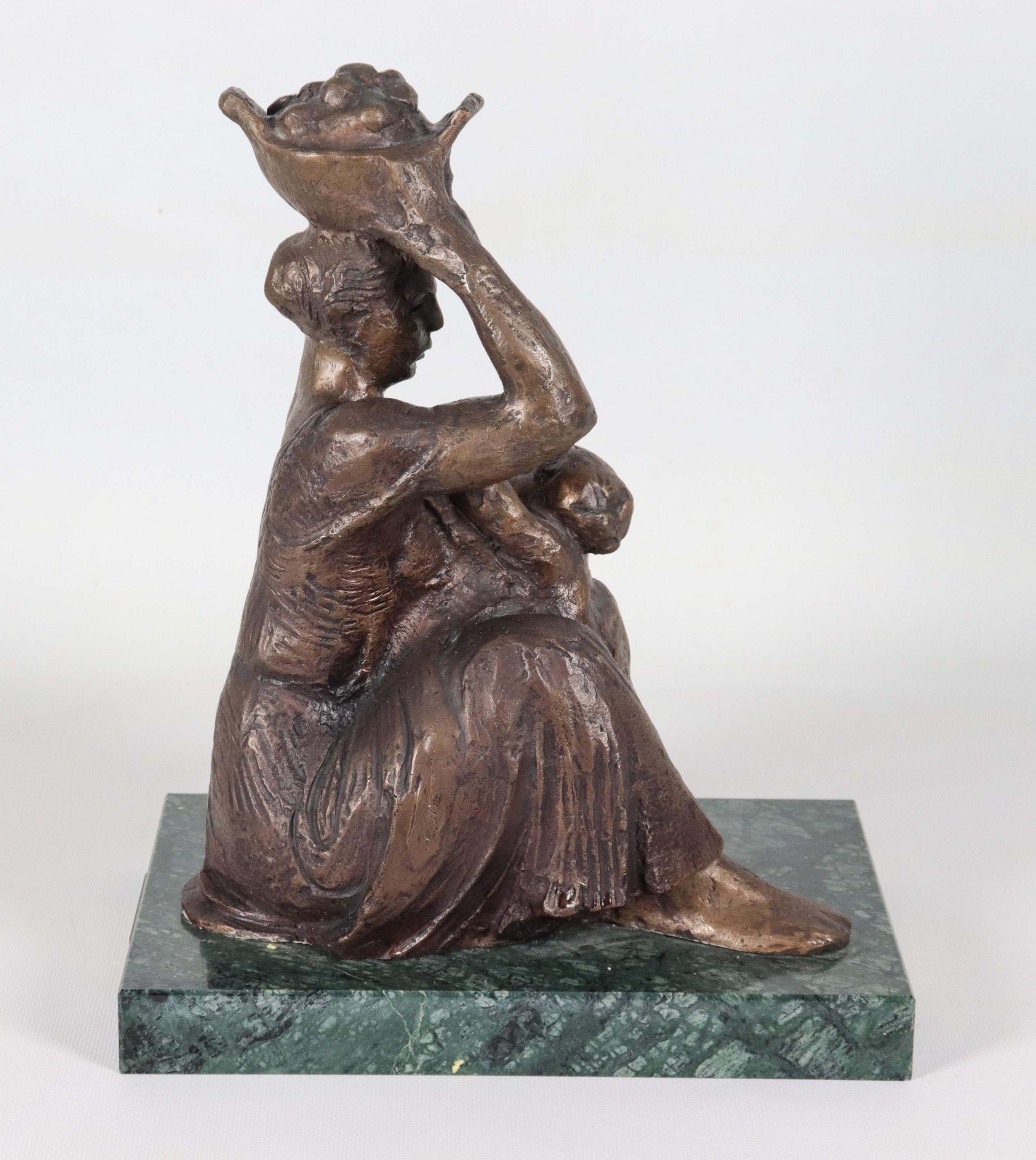 Att.to. "Venditrice di frutta con figlioletto", scultura in bronzo sorretta da base in marmo verd...