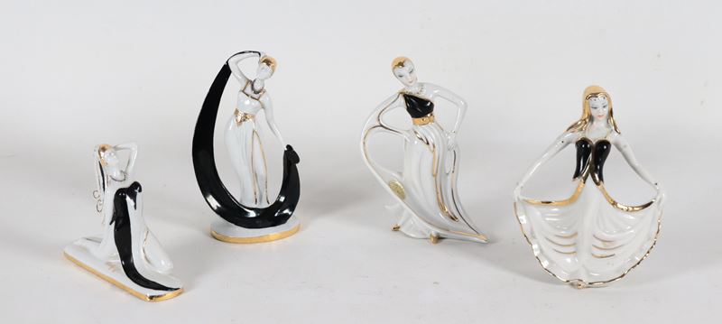 'Ballerine', lotto di quattro statuine di gusto Liberty in porcellana smaltata bianca e nera. Due...