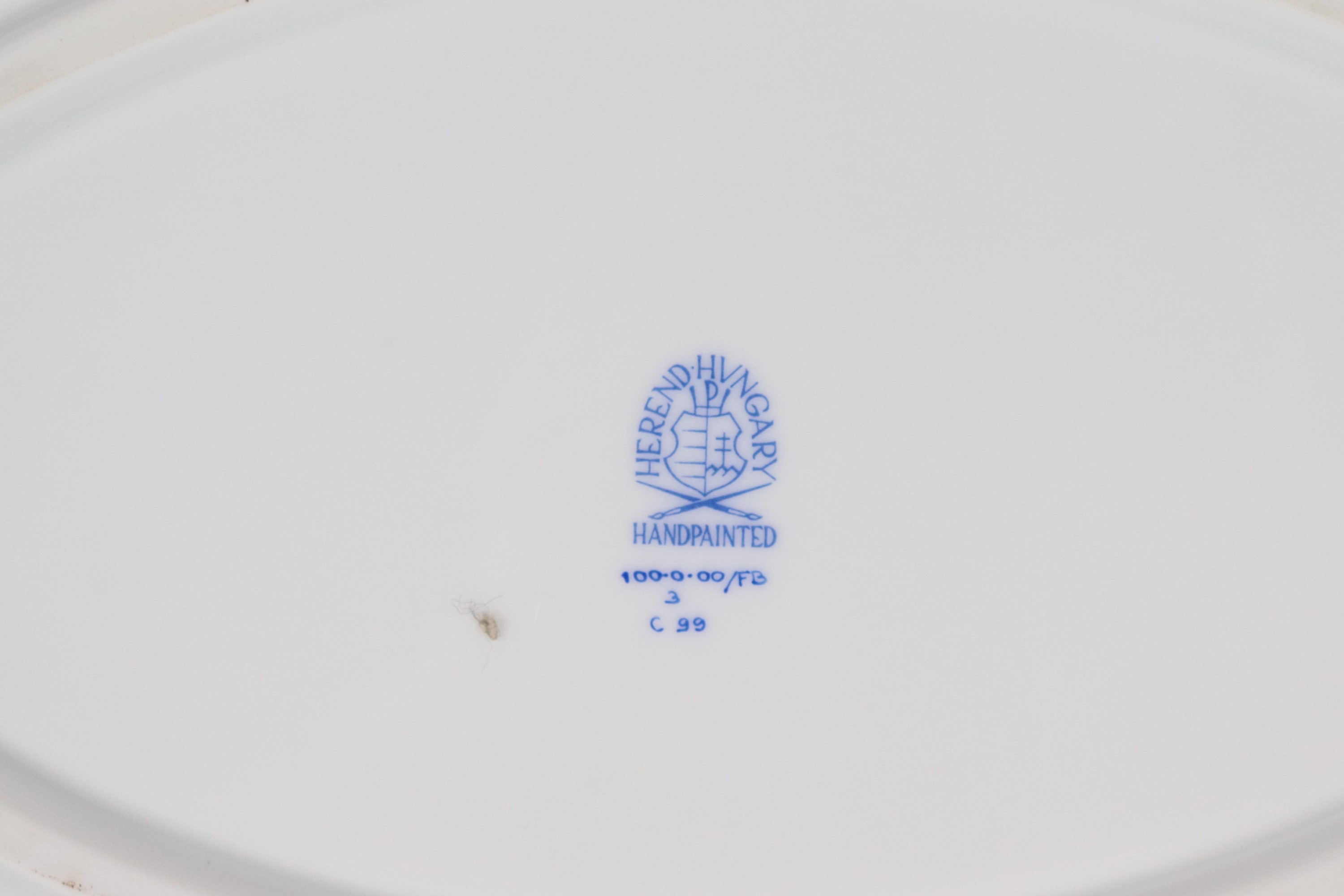 Servizio di piatti in porcellana Herend decoro Happonyi in azzurro su fondo bianco e bordi in oro...