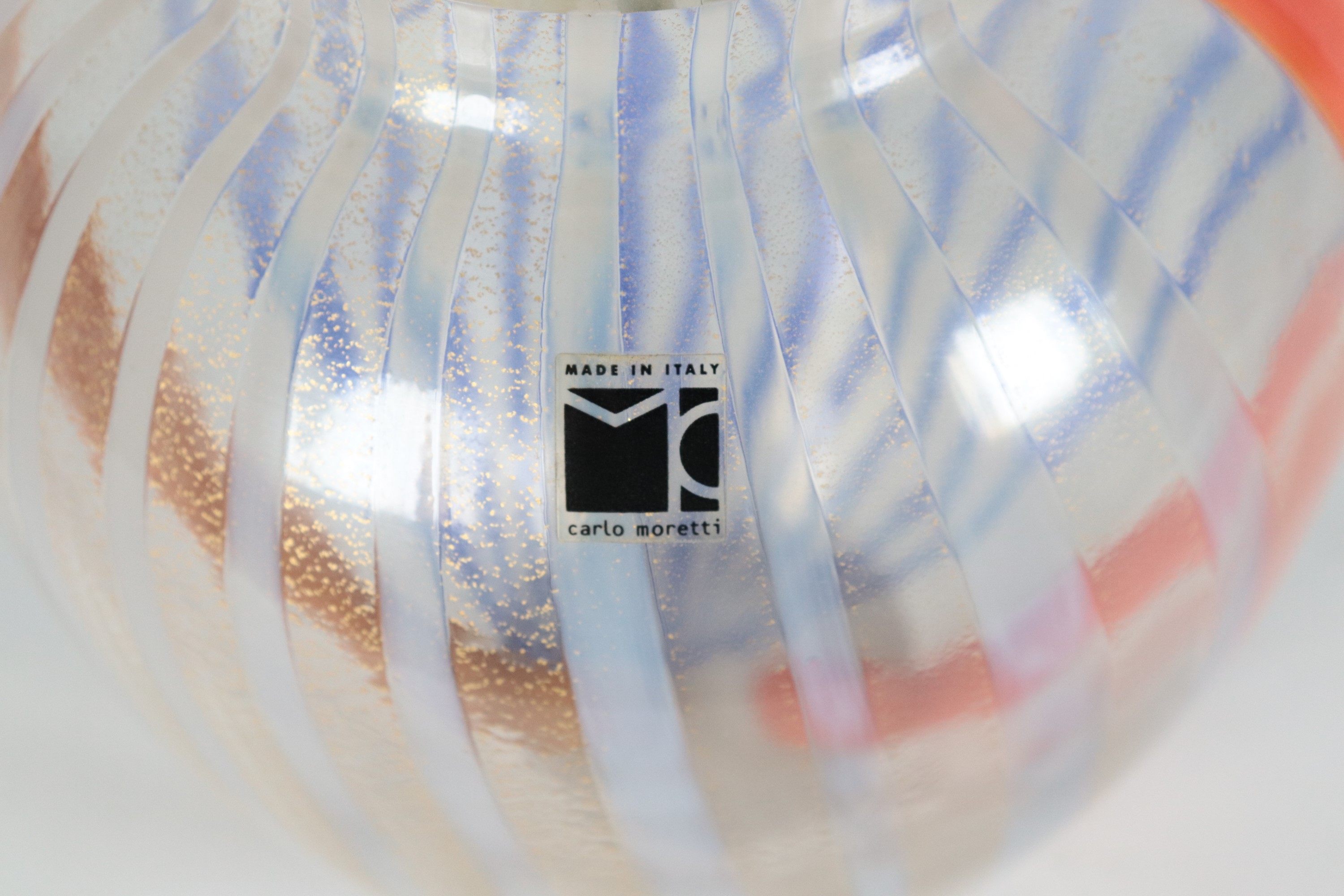 Vaso in vetro soffiato di Murano collezione Ipiccoli, con decorazioni a strisce in arancio, giall...