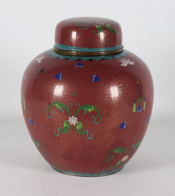 Small Chinese cloisonné enamel potiche, decorated with various polychromes on a red background
