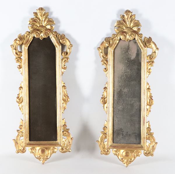 Pair of small mirrors in gilded wood and carved with Louis XV motifs, mercury mirrors