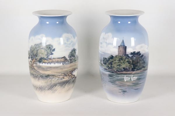Pair of Royal Copenhagen porcelain vases, with polychrome decorations featuring landscape motifs.