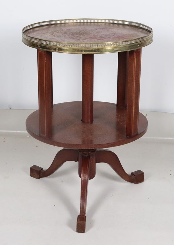 Small round-shaped revolving bookcase in mahogany