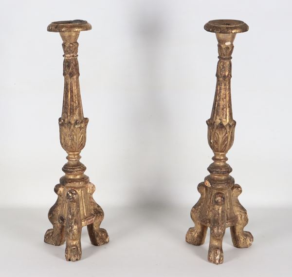 Pair of antique Louis XV table torches in gilded and carved wood