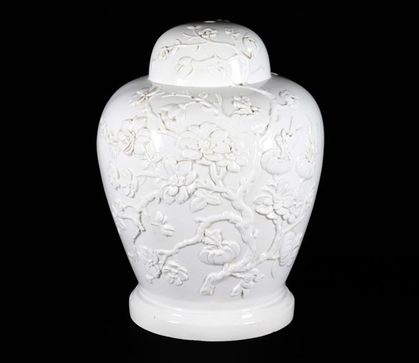 White porcelain potiche-shaped table lamp base with embossed lotus flower motifs