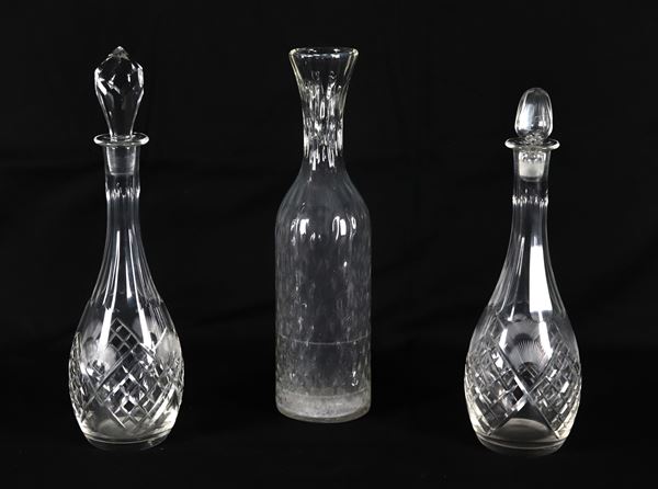 Lot of three worked crystal bottles, two for wine and one for water 