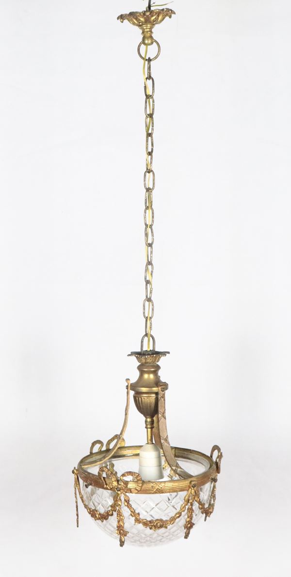 Antique small French ceiling lantern in gilded bronze, embossed and chiselled with Louis XVI motifs, with a diamond-pointed crystal cup, one light