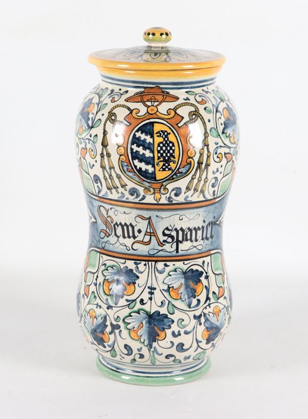 Albarello in polychrome glazed majolica from Deruta with family crest and floral scrolls