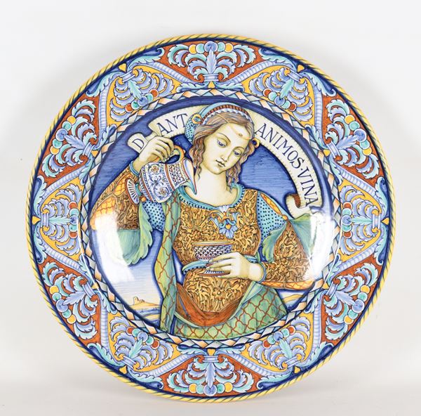 Grazia Deruta glazed majolica plate with floral scrolls and a "16th century lady" in the centre, painted by Maestro Luigi Vincioli (1909-1997)