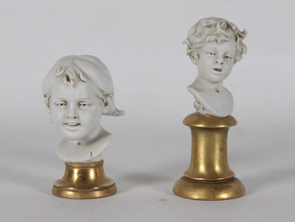 "Children's Faces", a batch of two white biscuit envelopes with pure gold bases