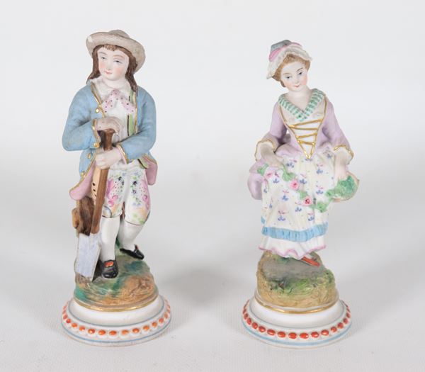Pair of French figurines "Lady" and "Knight" in polychrome biscuit