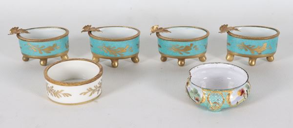 Lot of four small ashtrays in light blue porcelain and pure gold and two round bowls, one in white porcelain and pure gold and one in decorated enamels with various defects (6 pieces)