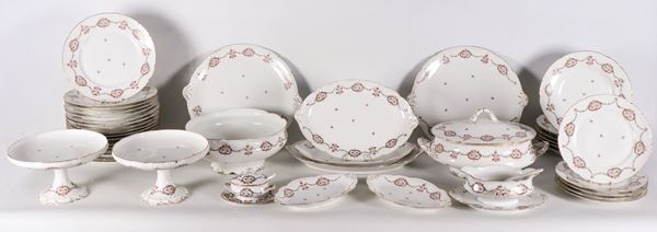 Antique Ginori porcelain dinner set, with polychrome floral festoon decorations and pure gold edges