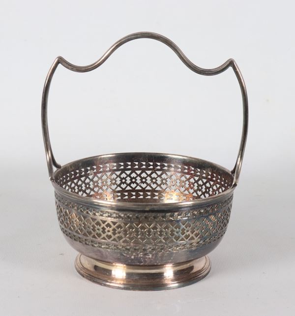 Antique silver metal basket with perforated edge and shaped handle