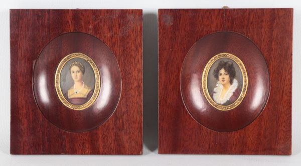 Pair of painted oval miniatures depicting "Young noblewomen", walnut frames