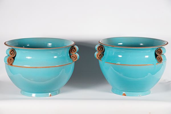 Pair of vase holders in glazed blue terracotta