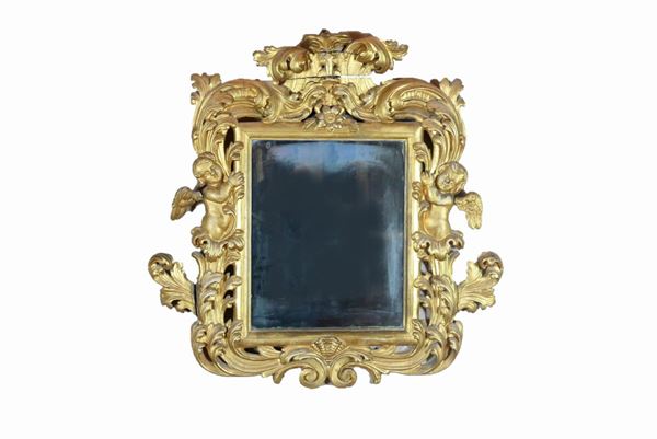 Tuscan Louis XV mirror in gilded wood