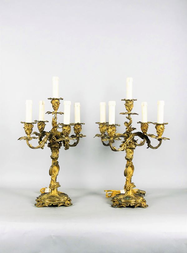 Pair of French Louis XV candelabra in gilded bronze