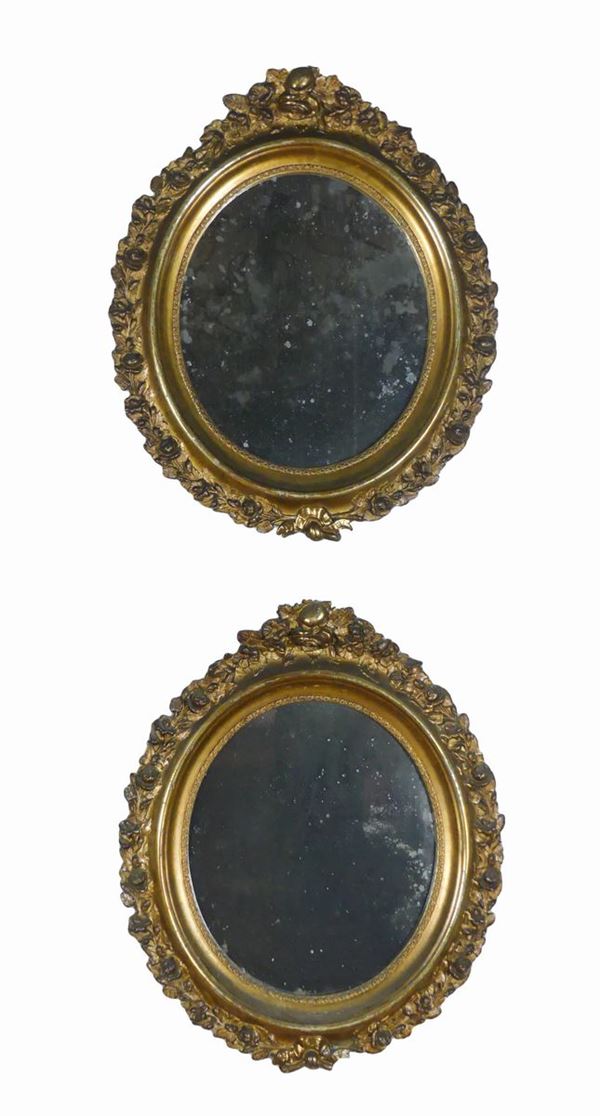 Pair of oval mirrors