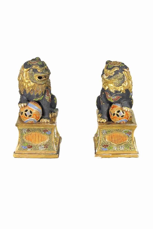Pair of Japanese Foo Dogs in porcelain