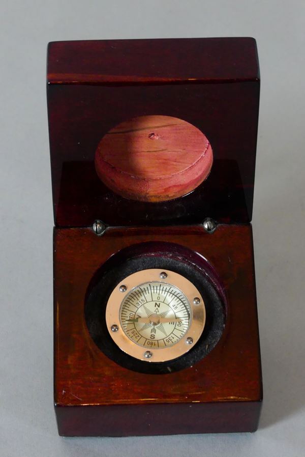 Small compass in walnut box