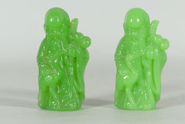 Pair of Chinese &quot;Santoni&quot; figurines in green jade
