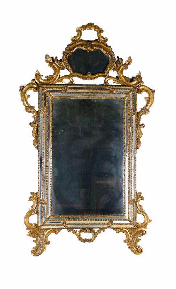 Venetian mirror in gilded wood of the Louis XV line
